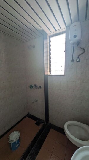 Bathroom in 3 BHK Apartment at Ashish Swapnalok Towers, Goregaon East – for Rent