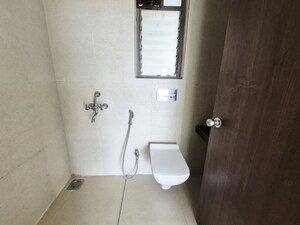 Bathroom in 1.5 BHK Apartment at Runwal My City Phase II Cluster 05, Dombivli East – for Rent
