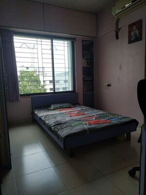 Bedroom in 2 BHK Apartment at Vyas Ranjeet, Kothrud – for Rent