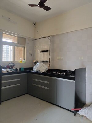 Kitchen in 2 BHK Apartment at Rosa Oasis Ph 2, Ghodbunder Road – for Rent