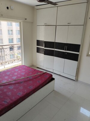 Bedroom in 2 BHK Apartment at Rosa Oasis Ph 2, Ghodbunder Road – for Rent