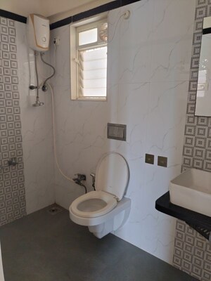 Bathroom in 2 BHK Apartment at Rosa Oasis Ph 2, Ghodbunder Road – for Rent