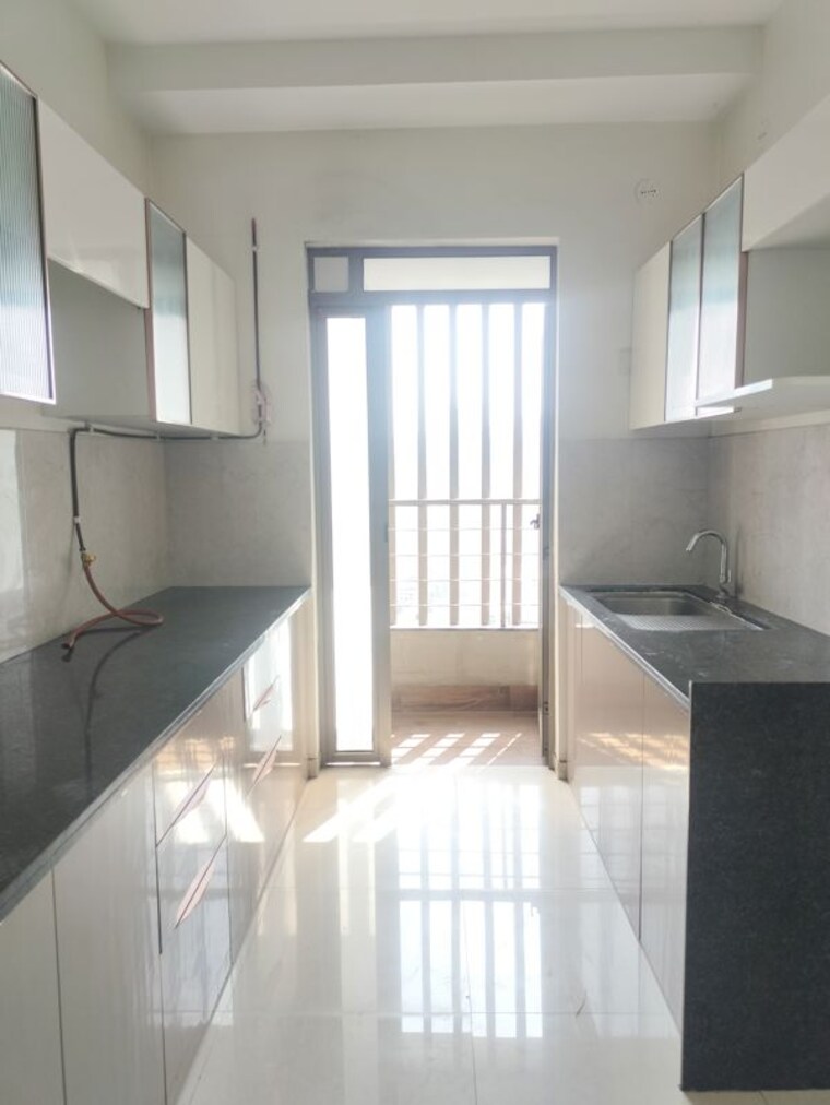 Kitchen, kalpataru-paramount-a 2 Bedroom 711 Sq.Ft. Apartment In Kapur Bawdi Thane 10363079
