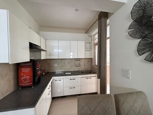 Kitchen in 3 BHK Apartment at S3 Green Avenue, Sector 85 – for Sale