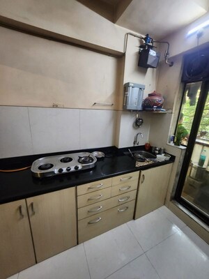 Kitchen in 2 BHK Apartment at Sanghvi Hills, Ghodbunder Road – for Rent