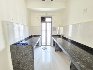 Kitchen in 3 BHK Apartment at Runwal My City, Dombivli East – for Rent