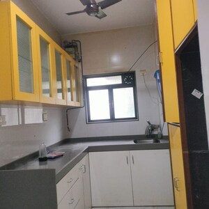 Kitchen in 2 BHK Apartment at Oshiwara Mhada, Andheri West – for Rent
