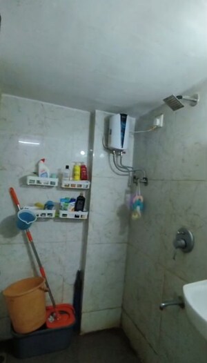 Bathroom in 1 BHK Apartment at RNA NG Canary, Mira Road – for Sale