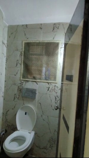 Bathroom in 1 BHK Apartment at RNA NG Canary, Mira Road – for Sale