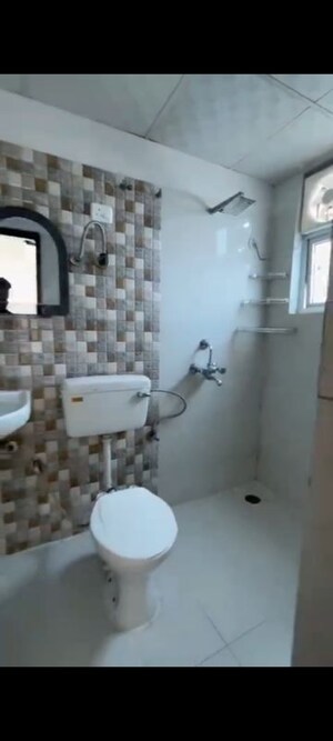 Bathroom in 3 BHK Apartment at Godrej Oasis, Sector 88a – for Sale