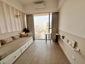 Living Room in 2 BHK Apartment at Transcon Triumph Tower, Andheri West – for Rent