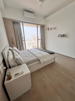 Bedroom in 2 BHK Apartment at Transcon Triumph Tower, Andheri West – for Rent