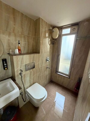 Bathroom in 1.5 BHK Apartment at Lodha Amara, Kolshet Road – for Rent