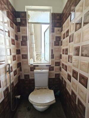 Bathroom in 1 RK Apartment at Puri Diplomatic Greens Phase I, Sector 111 – for Rent