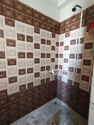 Bathroom in 1 RK Apartment at Puri Diplomatic Greens Phase I, Sector 111 – for Rent