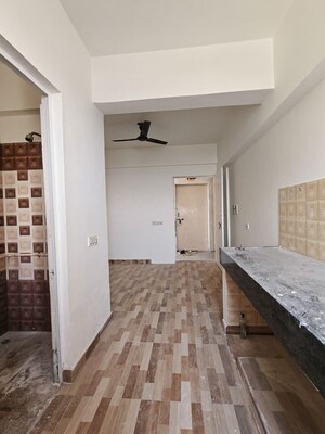 Kitchen in 1 RK Apartment at Puri Diplomatic Greens Phase I, Sector 111 – for Rent