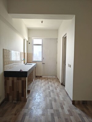 Kitchen in 1 RK Apartment at Puri Diplomatic Greens Phase I, Sector 111 – for Rent