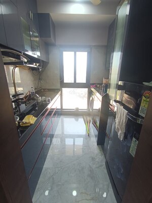 Kitchen in 1 BHK Apartment at Ajmera Boulevard, Malad West – for Rent