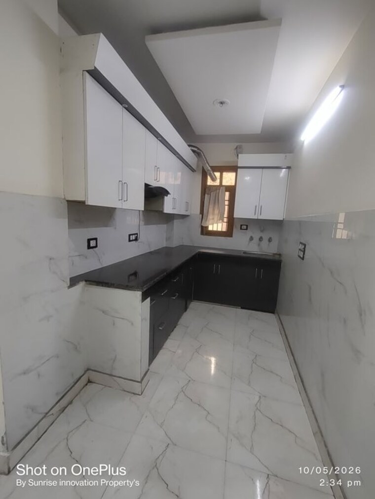 Kitchen, dwarka mor 3 Bedroom 110 Sq.Yd. Builder Floor In Dwarka Mor Delhi 10363398
