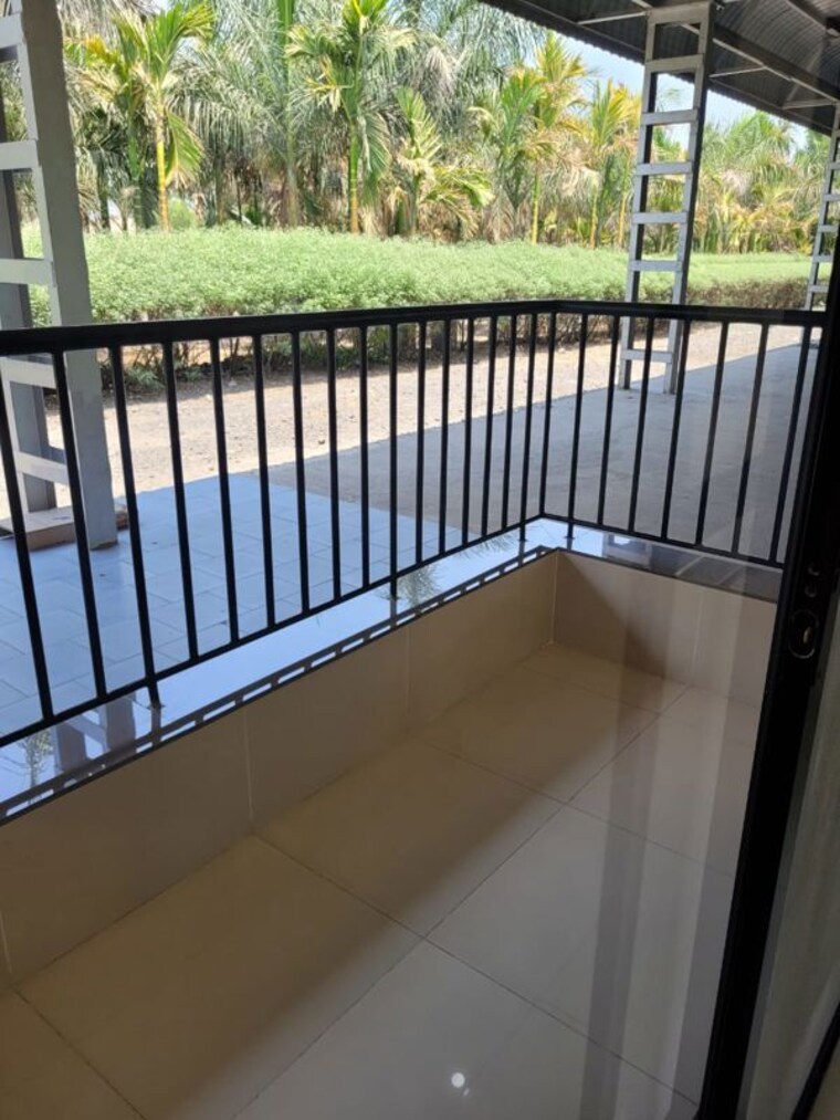 Balcony, magarpatta-riverview-city-hornbill-heights 2 Bedroom 900 Sq.Ft. Apartment In Loni Kalbhor Pune 10363453