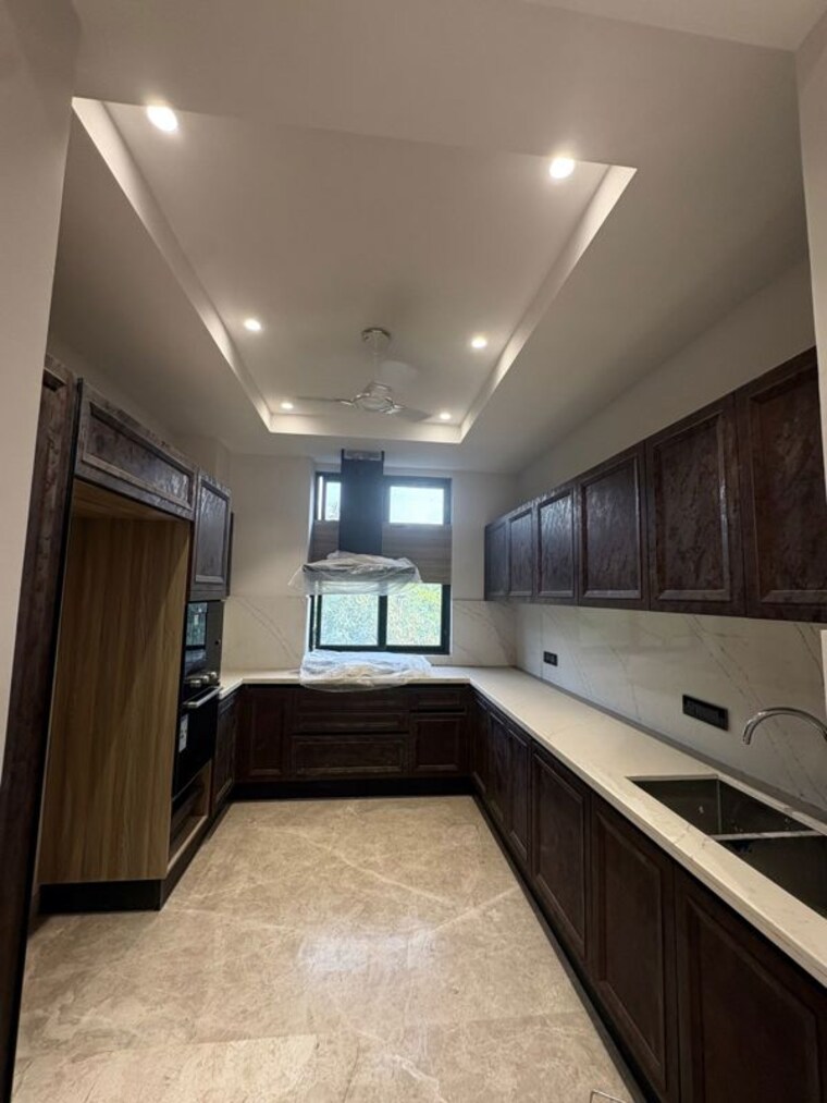 Kitchen, rajouri garden 4 Bedroom 270 Sq.Yd. Builder Floor In Rajouri Garden Delhi 10363507