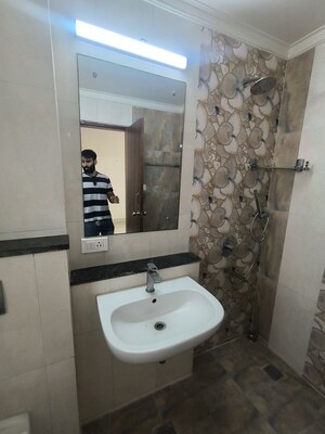 Bathroom in 4 BHK Apartment at Millenium Bajrang Society, Sector 43 – for Rent