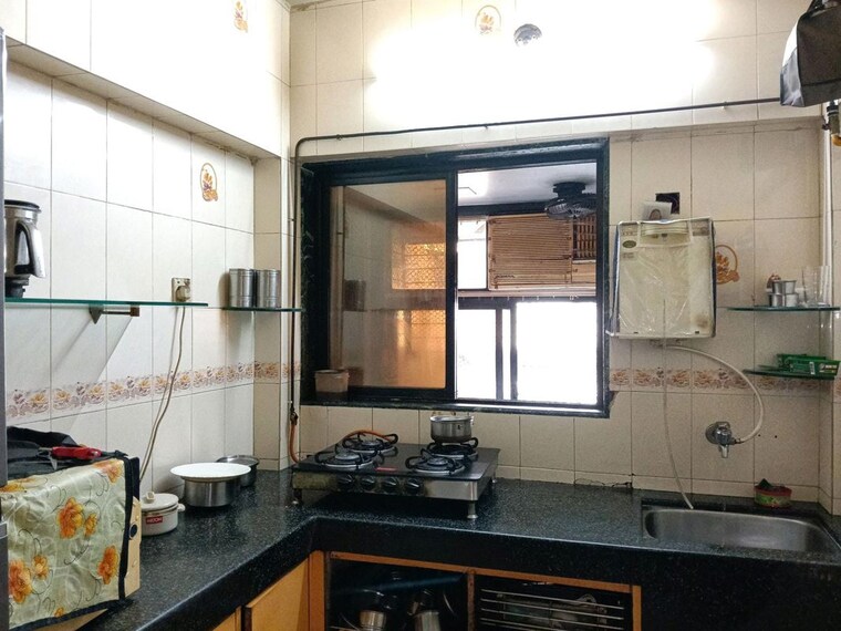Kitchen, highland-park 2 Bedroom 840 Sq.Ft. Apartment In Mulund West Mumbai 10363563