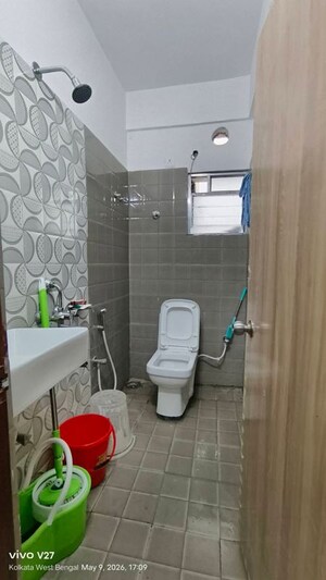 Bathroom in 2 BHK Apartment at Realtech Rajotto, Rajarhat – for Rent