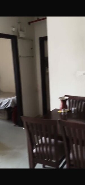Living Room in 1.5 BHK Apartment at Dosti West County, Balkum Pada – for Rent