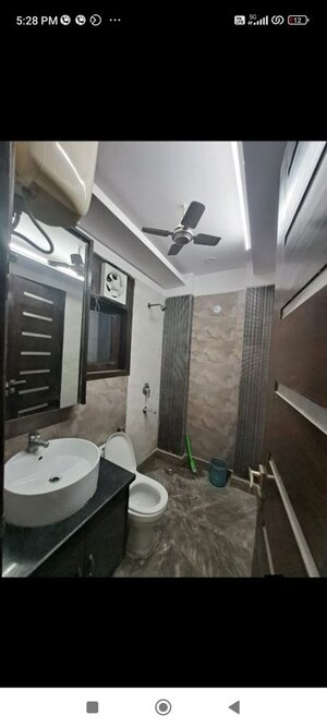 Bathroom in 3 BHK Builder Floor at Freedom Fighters Enclave – for Rent