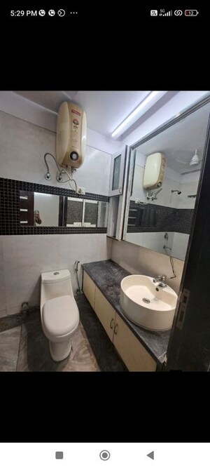 Bathroom in 3 BHK Builder Floor at Freedom Fighters Enclave – for Rent