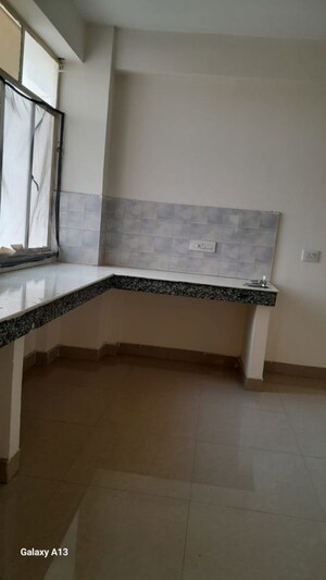 Kitchen in 2 BHK Apartment at Pareena Om Apartments, Sector 112 – for Rent