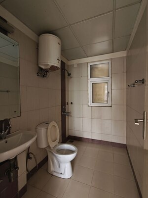 Bathroom in 2.5 BHK Apartment at Mahindra Aura, Sector 110a – for Rent