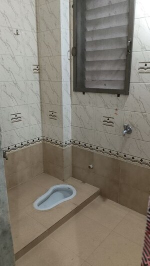 Bathroom in 1 BHK Apartment at Gautam Darshan CHS, Charai – for Rent
