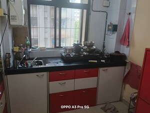 Kitchen in 2 BHK Apartment at Raunak Unnathi Woods Phase 4 And 5, Ghodbunder Road – for Rent