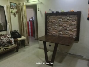 Living Room in 2 BHK Apartment at Raunak Unnathi Woods Phase 4 And 5, Ghodbunder Road – for Rent