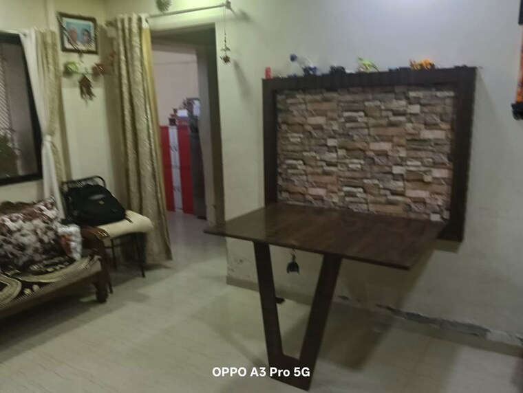 Living Room, raunak-unnathi-woods-phase-4-and-5 2 Bedroom 550 Sq.Ft. Apartment In Ghodbunder Road Thane 10363808