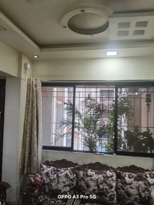 Living Room in 2 BHK Apartment at Raunak Unnathi Woods Phase 4 And 5, Ghodbunder Road – for Rent