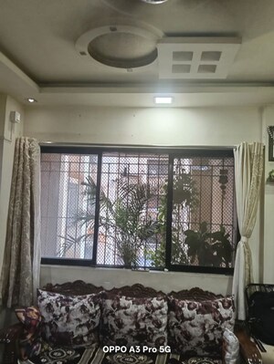 Living Room in 2 BHK Apartment at Raunak Unnathi Woods Phase 4 And 5, Ghodbunder Road – for Rent