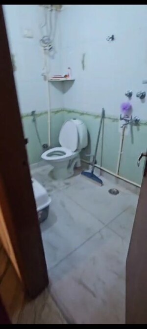 Bathroom in 2 BHK Builder Floor at Kalkaji – for Rent