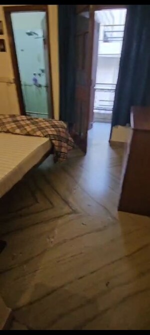Bedroom in 2 BHK Builder Floor at Kalkaji – for Rent