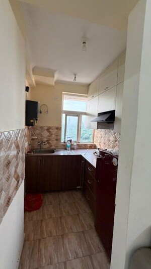 Kitchen in 2 BHK Apartment at Amrapali Leisure Park, Amrapali Leisure Valley – for Rent