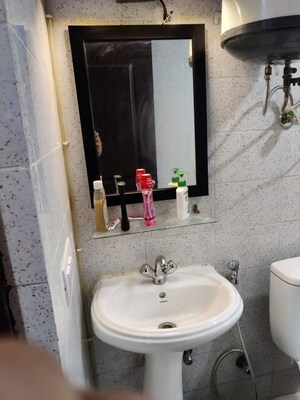 Bathroom in 1 RK Apartment at Logix Blossom Zest, Sector 143 – for Rent