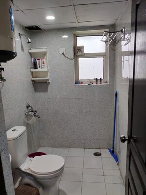 Bathroom in 1 RK Apartment at Logix Blossom Zest, Sector 143 – for Rent