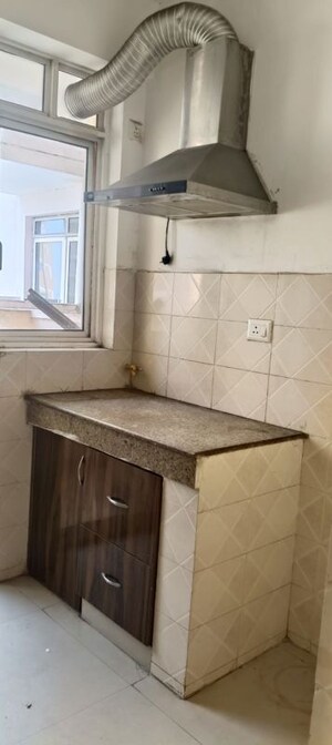 Kitchen in 2 BHK Apartment at Logix Blossom Zest, Sector 143 – for Rent