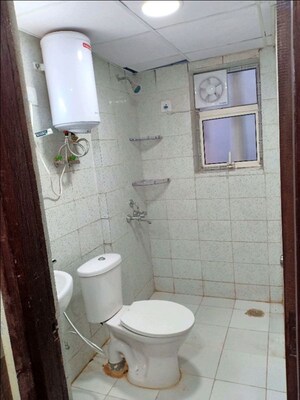 Bathroom in 1 RK Apartment at Logix Blossom Zest, Sector 143 – for Rent