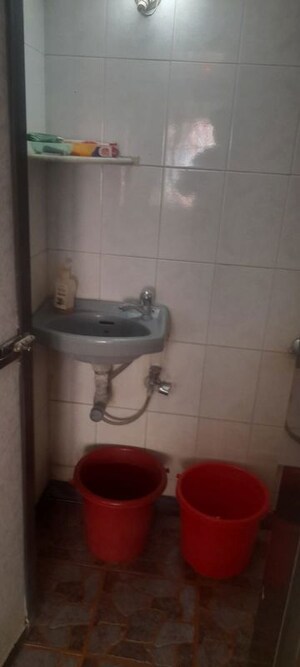 Bathroom in 2 BHK Apartment at Vedant Complex CHS, Samata Nagar – for Rent