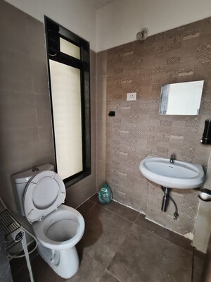 Bathroom in 2 BHK Apartment at Acme Ozone, Manpada – for Rent