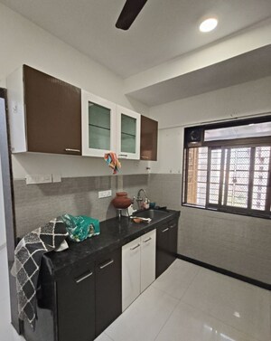 Kitchen in 2 BHK Apartment at Acme Ozone, Manpada – for Rent