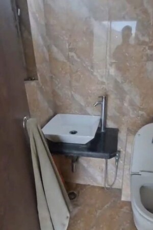 Bathroom in 2 BHK Apartment at Bharat Ecovistas, Shilphata – for Rent